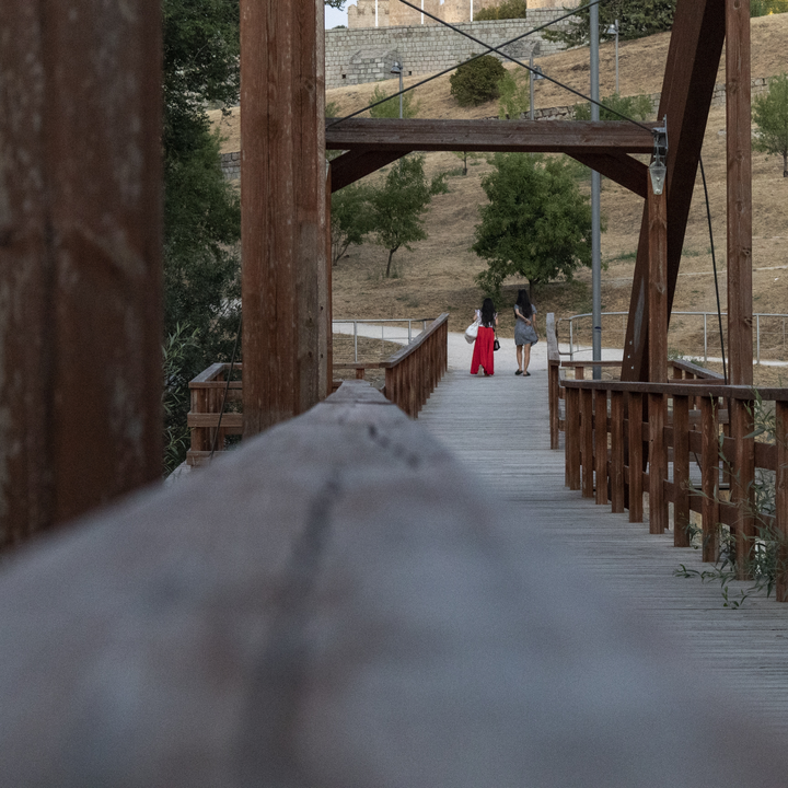  Wooden Bridge in Park Setting Leading to Hillside Path in Ávila, Spain 
