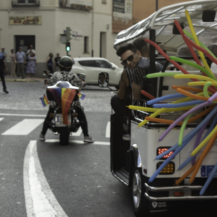  Colourful parade float with people celebrating Pride Day in Ávila, Spain, during the annual LGBTQ+ festival (2025) 