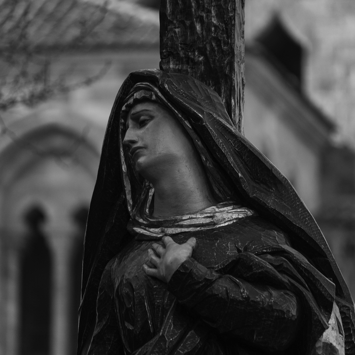 Procession of Our Lady of Solitude departing from San Pedro Apóstol Church in Ávila, Spain. 