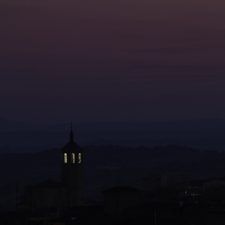  Nightfall with dust and ash, over the Avila's city center after several fires in the central plateau, Castile, Spain. 